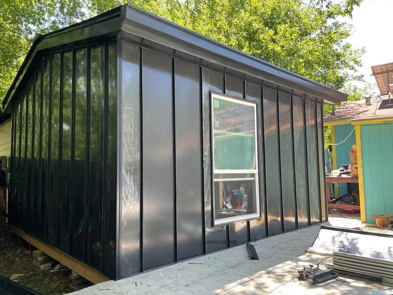 Black standing seam metal wall panels for Metal Roof Installation in Little Chute