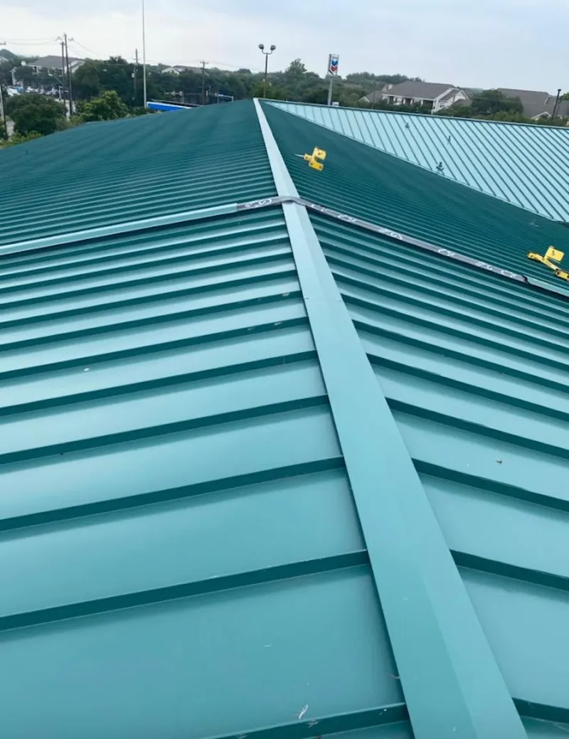 Green commercial metal roof ridge and valley for Metal Roof Repair in Little Chute